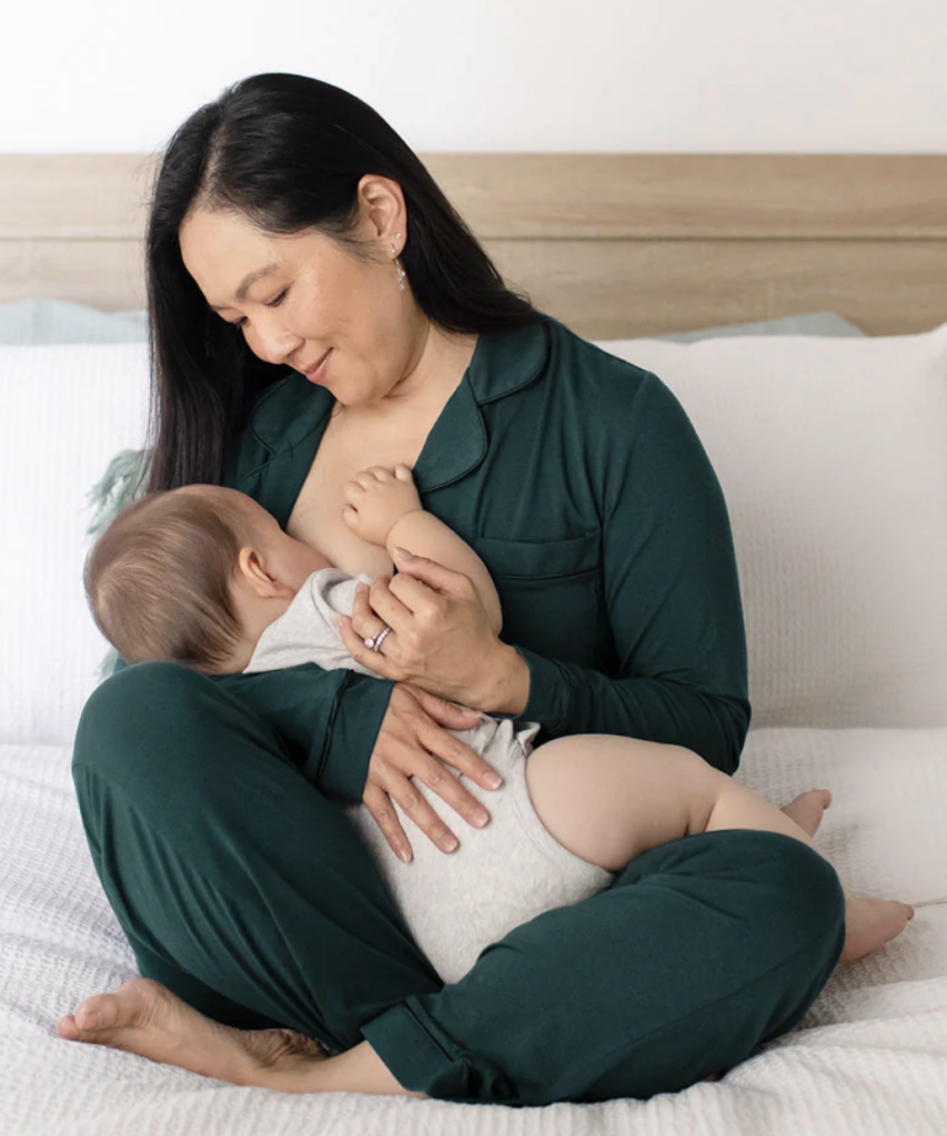 postpartum woman nursing baby
